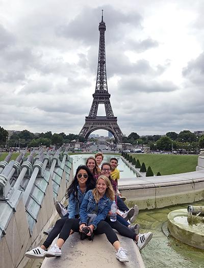 Students outside the Eiffel Tower in Paris